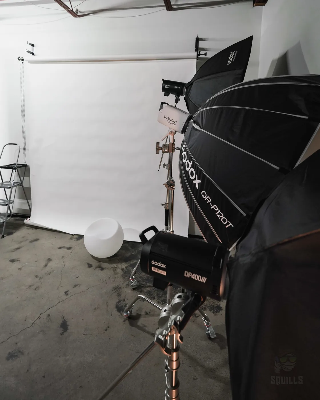 Final Lap studio white backdrop with professional lighting setup
